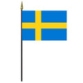 Swedish flag on a black pole
