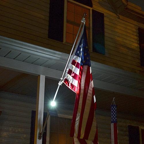 flag at night with spotlight