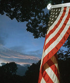 American flag against twilight sky