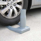 gray car tire chock on ground