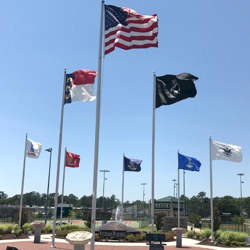 Shoe Base Flagpole displaying flags