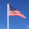American flag waving in sky