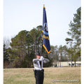 flag bearing soldier outdoors