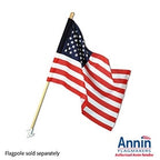 American flag on wooden pole