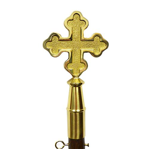 golden cross on a ceremonial key