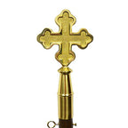 golden cross on a ceremonial key