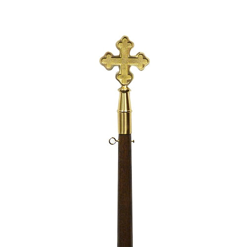 gold cross on wooden staff