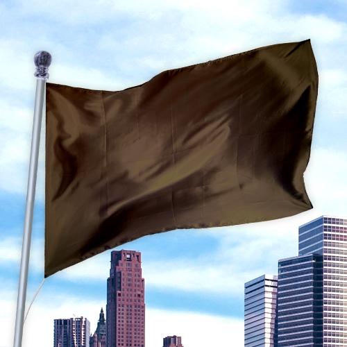 Solid Colored Flags - Premier Nylon dark brown flag waving on a pole against a city skyline background.