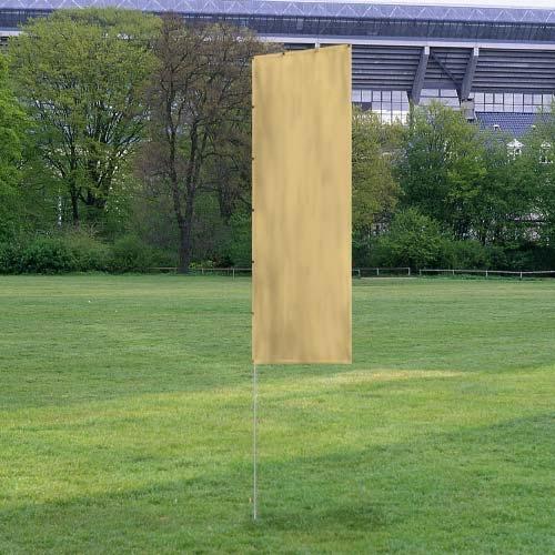 Solid Tall Advertising Flags in a plain tan color displayed outdoors on a grassy field with trees and buildings in the background.