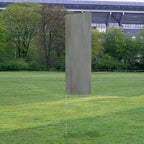 Solid Tall Advertising Flags displayed outdoors on a grassy field with a plain gray vertical banner attached to a pole.