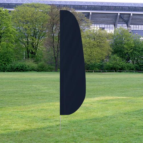 Solid Color Feather Flags in black standing on a grassy field with trees and a stadium in the background.