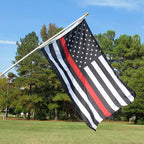 black and white flag with red strip