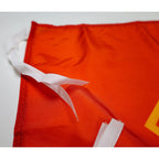 white tie straps on flag