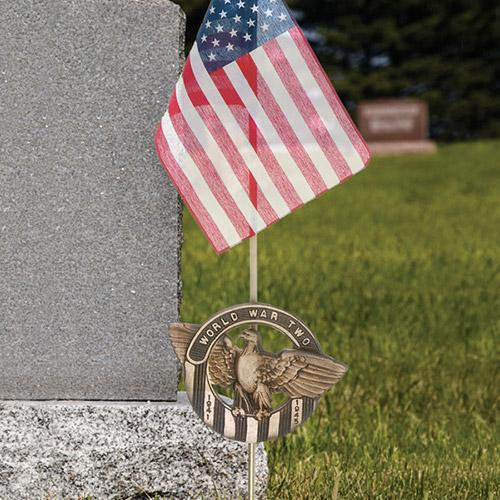 US flag and WWII memorial marker