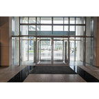 glass entrance with revolving doors