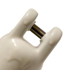 white plastic tool with metal prong