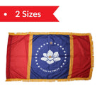 Indoor Mississippi state flag with magnolia emblem, stars, gold fringe, and red side panels