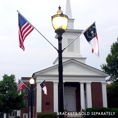 church with flags and lamp post