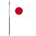 Japan flag on black flagpole
