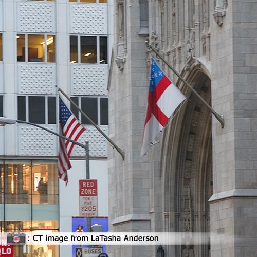 flags flying outside building