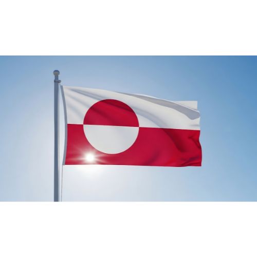 Outdoor Greenland Flag waving in the wind against a clear blue sky with sunlight shining through the fabric.