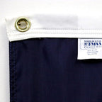 Brass grommets in the OR flag
