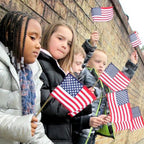 Kids holding safety style flags