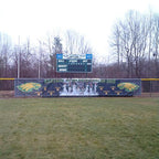 scoreboard and banner at softball f
