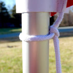 knot tied on metal pole