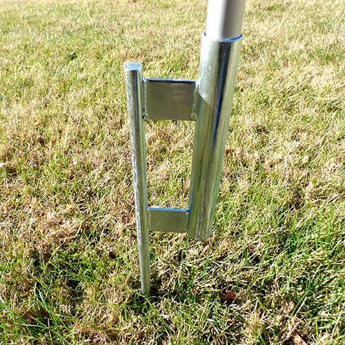 metal ground anchor in grass